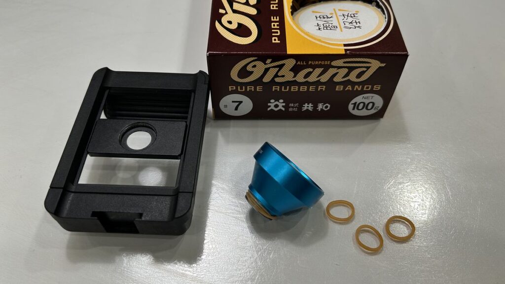 #7ゴムバンドとポラロイドx5望遠レンズ